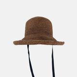 PCNQ CLEO Raffia Round Raffia Sun Hat with Ribbon Ties in Brown - Big Bag NY
