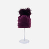 Angiolo Frasconi Rolled Trim Beanie with Fur Pom Pom in Burgundy - Big Bag NY