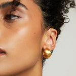 Dean Davidson's Flow Huggie Hoops in Gold - Big Bag NY