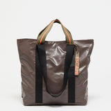 Jack Gomme Escape Calvi Tote in Root - Big Bag NY A brown tote with both short handles and long shoulder straps
 with an outside pocket for phone or water  bottle.