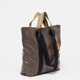 Jack Gomme Escape Calvi Tote in Root - Big Bag NY A brown tote with both short handles and long shoulder straps
 with an outside pocket for phone or water  bottle.