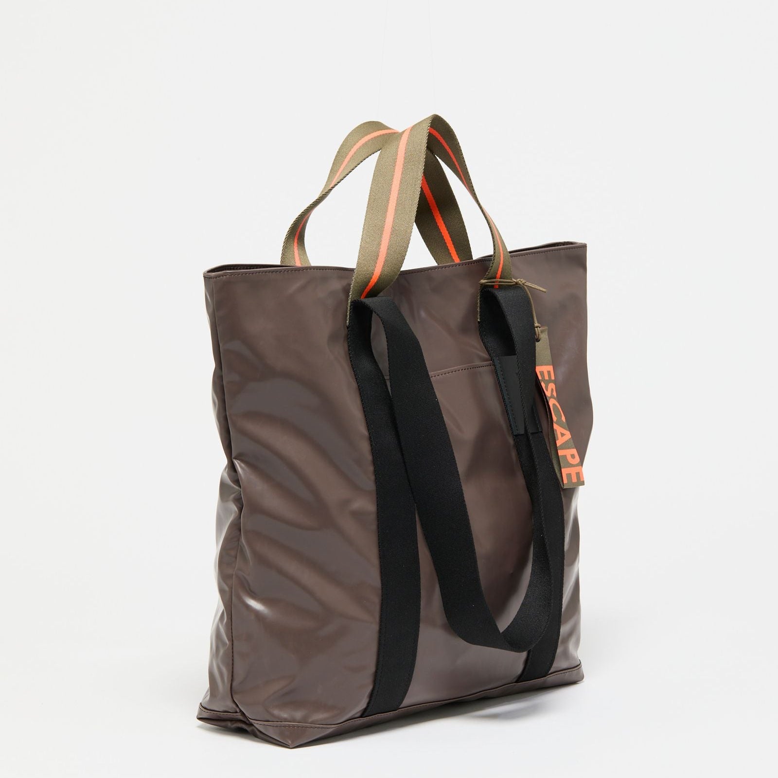 Jack Gomme Escape Calvi Tote in Root - Big Bag NY A brown tote with both short handles and long shoulder straps
 with an outside pocket for phone or water  bottle.